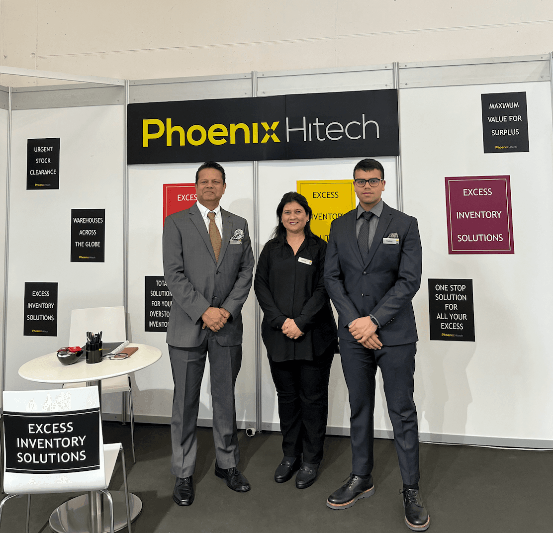 Phoenix Hitech specialist reviewing inventory in a global distribution warehouse