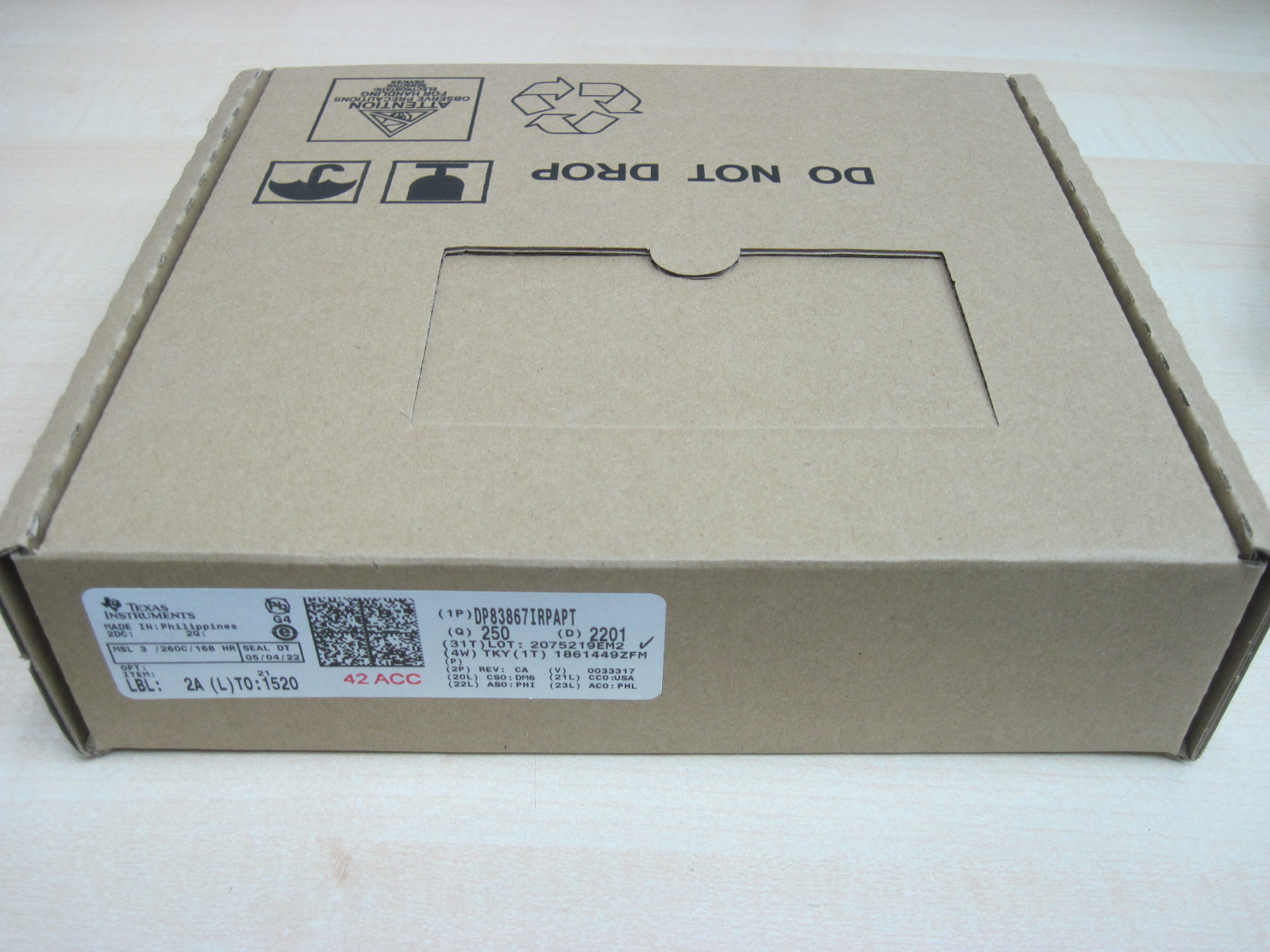 Packing box on table of TI brand